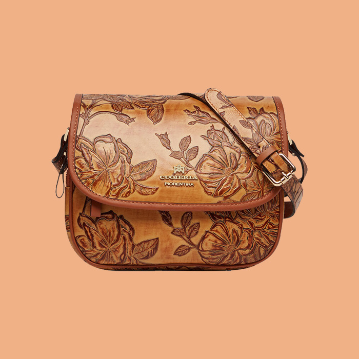 small brown bag with embossed flowers